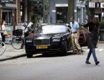 Amsterdam 23 juli 2016 
Advocaat Gerard Spong met zijn Rolls Royce en zijn hondje