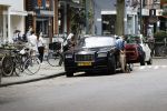 Amsterdam 23 juli 2016 
Advocaat Gerard Spong met zijn Rolls Royce en zijn hondje