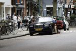 Amsterdam 23 juli 2016 
Advocaat Gerard Spong met zijn Rolls Royce en zijn hondje
