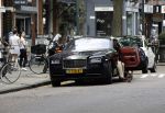Amsterdam 23 juli 2016 
Advocaat Gerard Spong met zijn Rolls Royce en zijn hondje
