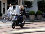 Amsterdam 6 juli 2016 
Hajo Bruins met ik denk zijn oudste dochter op de scooter