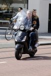 Amsterdam 6 juli 2016 
Hajo Bruins met ik denk zijn oudste dochter op de scooter