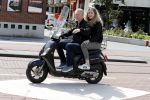 Amsterdam 6 juli 2016 
Hajo Bruins met ik denk zijn oudste dochter op de scooter