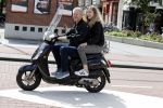 Amsterdam 6 juli 2016 
Hajo Bruins met ik denk zijn oudste dochter op de scooter