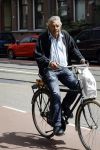 Amsterdam 12 juli 2016  
Jan Stekelenburg op de fiets in Amsterdam.