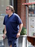 Amsterdam 23 juli 2016
 Robert jensen doet boodschappen met zijn mercedes SL 500 cabrio