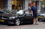 Amsterdam 23 juli 2016
 Robert jensen doet boodschappen met zijn mercedes SL 500 cabrio