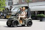 Amsterdam 26 juni 2017 
Connie Witteman en haar verloofde Eugene v Dun in hun gepimpte wagentje / karretje in Amsterdam zuid.