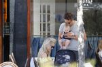 Amsterdam 17 juli 2018
Chantal janzen met man Marco Geeratz en hun zoontje op etrras en achter de kinderwagen.
