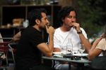Amsterdam 24 juli 2018
Dotan Harpenau met (een) vriend op terras in Amsterdam.