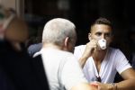 Amsterdam 24 juli 2018
Dusan tadic ( speler ajax) op terras bij v Dam.