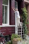 Amsterdam 12 juli 2018
Hajo Bruins aan het klussen bij zijn huis.