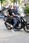 Amsterdam 18 juli 2018
Ruud Gullit en Karin de Rooij op scooter