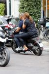 Amsterdam 18 juli 2018
Ruud Gullit en Karin de Rooij op scooter