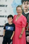 Amsterdam 20 juli 2022
Premiere Strijder in Tuschinski. Soufiane Touzani , Martijn Fischer Maartje v d Wetering Maik Cillekens Anouar Kasmi en Kailani Busker spelen de hoofdrollen. Roos Schlikker kwam met haar zoon