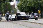 Amsterdam 16 juli 2023
Birgit Schuurman met zoontje op de fiets . Haar vriend Sander v Haarlem rijdt op scooter