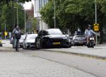 Amsterdam 16 juli 2023
Birgit Schuurman met zoontje op de fiets . Haar vriend Sander v Haarlem rijdt op scooter