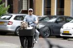 Amsterdam 14 juli 2023
Davy Klaassen met vriendin en hond op de bakfiets in Amsterdam zuid.
