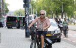 Amsterdam 18 juli 2024
Oud politicus Roger v Boxtel op de fiets in Amsterdam.