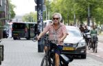 Amsterdam 18 juli 2024
Oud politicus Roger v Boxtel op de fiets in Amsterdam.