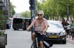 Amsterdam 18 juli 2024
Oud politicus Roger v Boxtel op de fiets in Amsterdam.