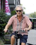 Amsterdam 18 juli 2024
Oud politicus Roger v Boxtel op de fiets in Amsterdam.