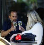 Amsterdam 17 juli 2025
Johnny van t Schip en Danielle  Zwanikken op terras en op straat in het centrum van Amsterdam.