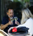 Amsterdam 17 juli 2025
Johnny van t Schip en Danielle  Zwanikken op terras en op straat in het centrum van Amsterdam.