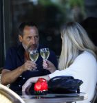 Amsterdam 17 juli 2025
Johnny van t Schip en Danielle  Zwanikken op terras en op straat in het centrum van Amsterdam.