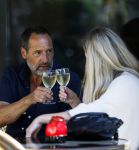 Amsterdam 17 juli 2025
Johnny van t Schip en Danielle  Zwanikken op terras en op straat in het centrum van Amsterdam.