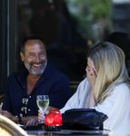 Amsterdam 17 juli 2025
Johnny van t Schip en Danielle  Zwanikken op terras en op straat in het centrum van Amsterdam.
