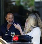 Amsterdam 17 juli 2025
Johnny van t Schip en Danielle  Zwanikken op terras en op straat in het centrum van Amsterdam.
