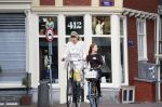 Amsterdam 18 juli 2025
Mieke v d Weij op de fiets in het centrum van Amsterdam .