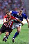 Eindhoven 22 augustus 2001
PSV-Fc Den Bosch
Arnold Bruggink in duel met Koen van Laak