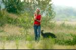 Hilversum 28 augustus 2002
Wendy v Dijk met gsm en hond wandelend op de hei.