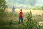 Hilversum 28 augustus 2002
Wendy v Dijk met gsm en hond wandelend op de hei.