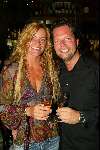 Rotterdam 24 augustus 2003
Surprise feestje inge de bruijn in baja beachclub
Inge de Bruijn met een glaasje wijn en Guido den Aantrekker