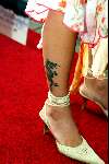 Amsterdam 4 augustus 2003
Premiere Tomb Raider in tushinski
Jennifer de Jong met man en tatoo