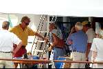 Porto Ercole 6 augustus 2003
Prins Bernhard en Prins Willem Alexander op de Jumbo VI met beveiligingsbeambtes