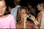 Curacao 13 augustus 2004
Marco Borsato optreden op Mambo Beach.   
Leontine Borsato met digitale camera