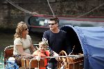 Amsterdam 1 augustus 2004
Martijn Krabbe met Amanda (zwanger) en Bikkel op sloep varen  in de grachten van Amsterdam