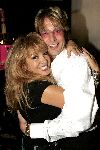 Bloemendaal 31 augustus 2004
Feestje radio Veronica bij strandtent Vroeger.
Adam Curry en Patricia Paay