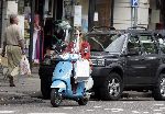 Amsterdam  2 augustus 2005
Danielle Overgaag op nieuwe vespa scooter