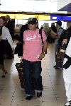 Schiphol 1 augustus 2005
Diego Armando Maradona met petje op schiphol