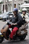 Amsterdam 24 augustus 2005
Henk Schiffmacher met zijn vrouw Louise op vespa scooter