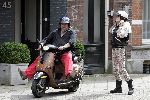 Amsterdam 24 augustus 2005
Henk Schiffmacher met zijn vrouw Louise op vespa scooter