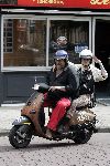 Amsterdam 24 augustus 2005
Henk Schiffmacher met zijn vrouw Louise op vespa scooter
