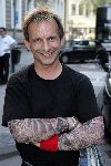 Amsterdam 31 augustus 2005
Presentatie Glamour en Lady card in Amstel hotel.
Johan Vlemmix met tatoo shirt