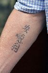 Hilversum 3 augustus 2005
  Joop Kruis met tatoeage van andre Hazes op arm