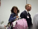 Schiphol 9 augustus 2005
Harry mens met zijn nieuwe vriendin Lara op  Schiphol